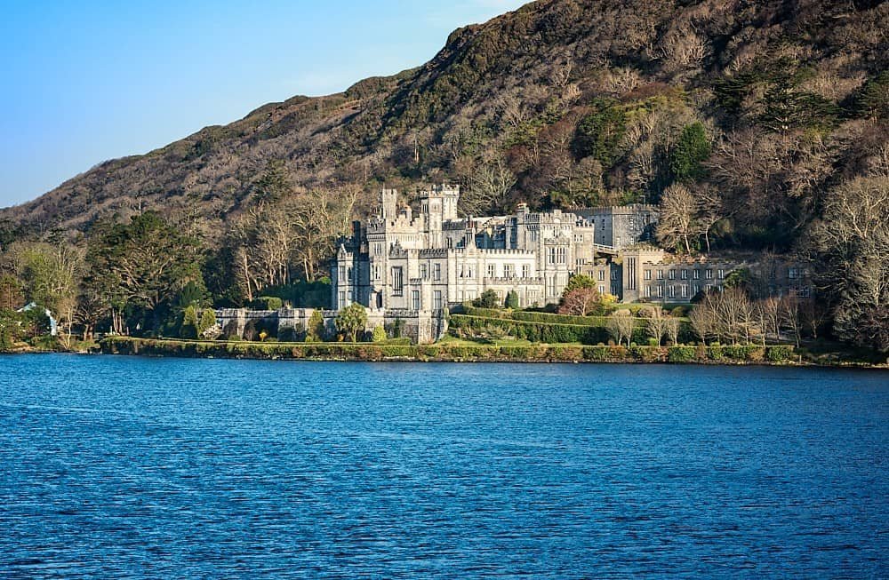Kylemore Abbey and its lakeside setting in Connemara, Ireland