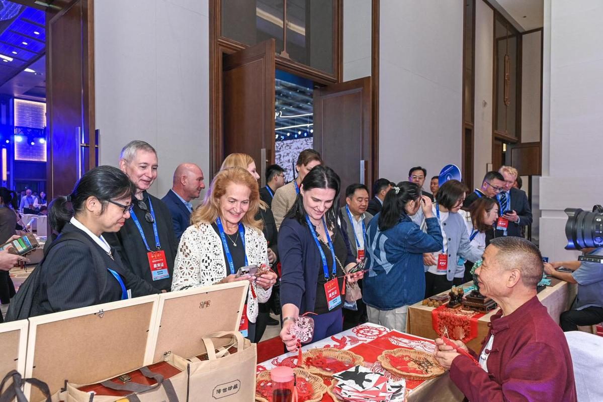 Travel trade delegates meeting at an exhibition in China